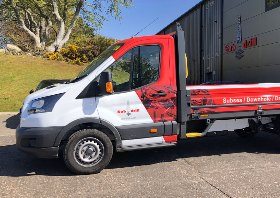 vehicle branding on dropside truck